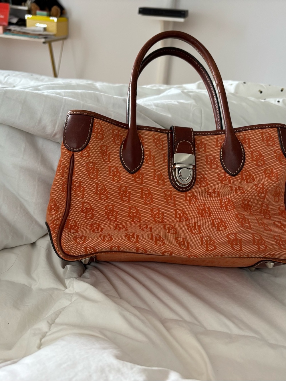 Dooney & Bourke Orange Monogram Satchel with Brown Leather Trim